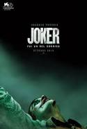 La risata del Joker terrorizza l’America. Polizia e divieto di maschere per il film di Phoenix